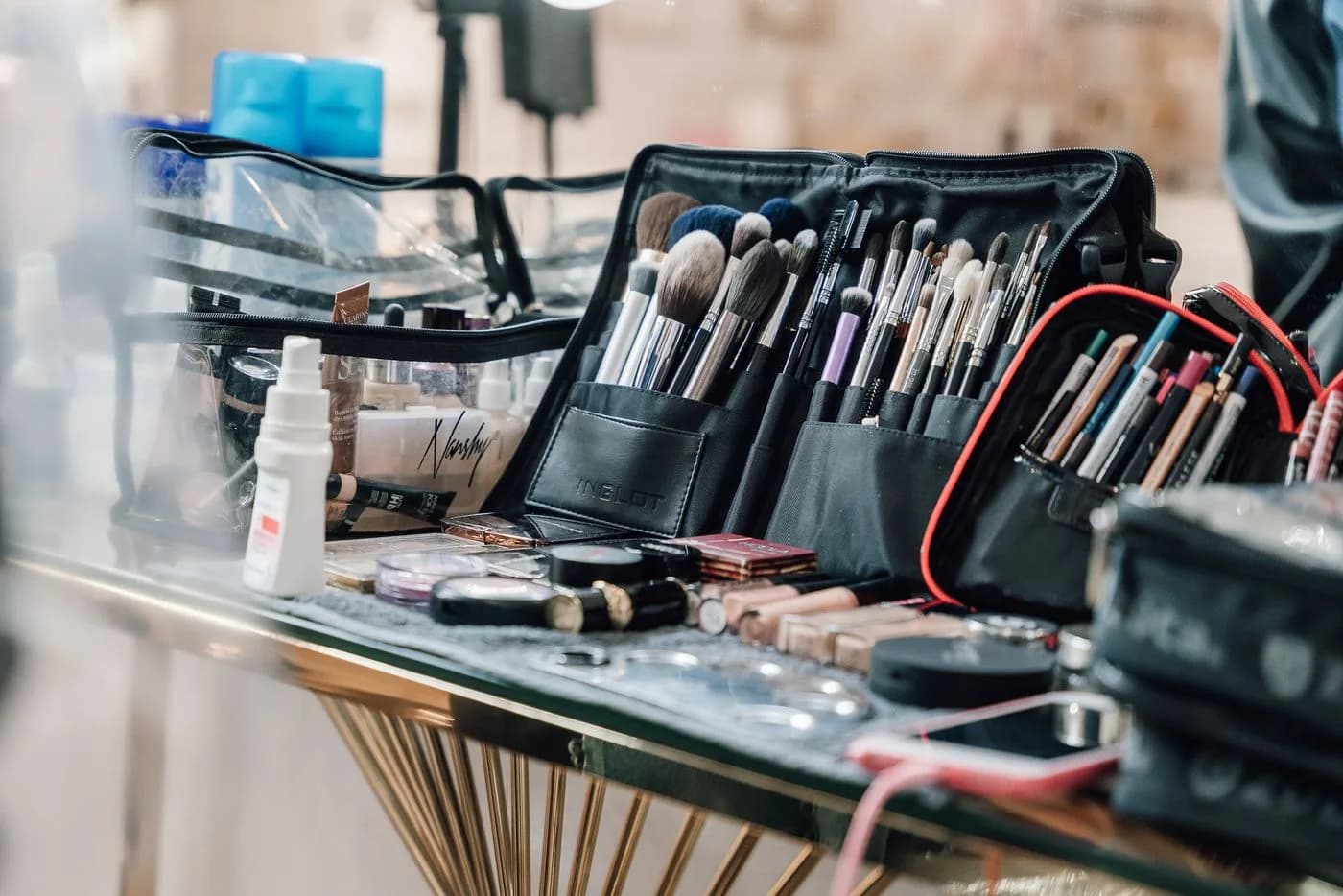 Professional makeup brushes and a working artist’s kit